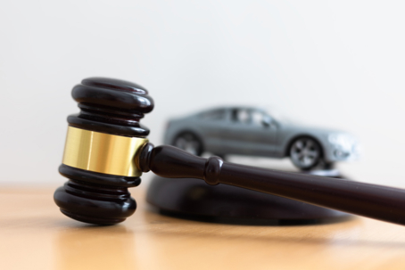 Gavel and car