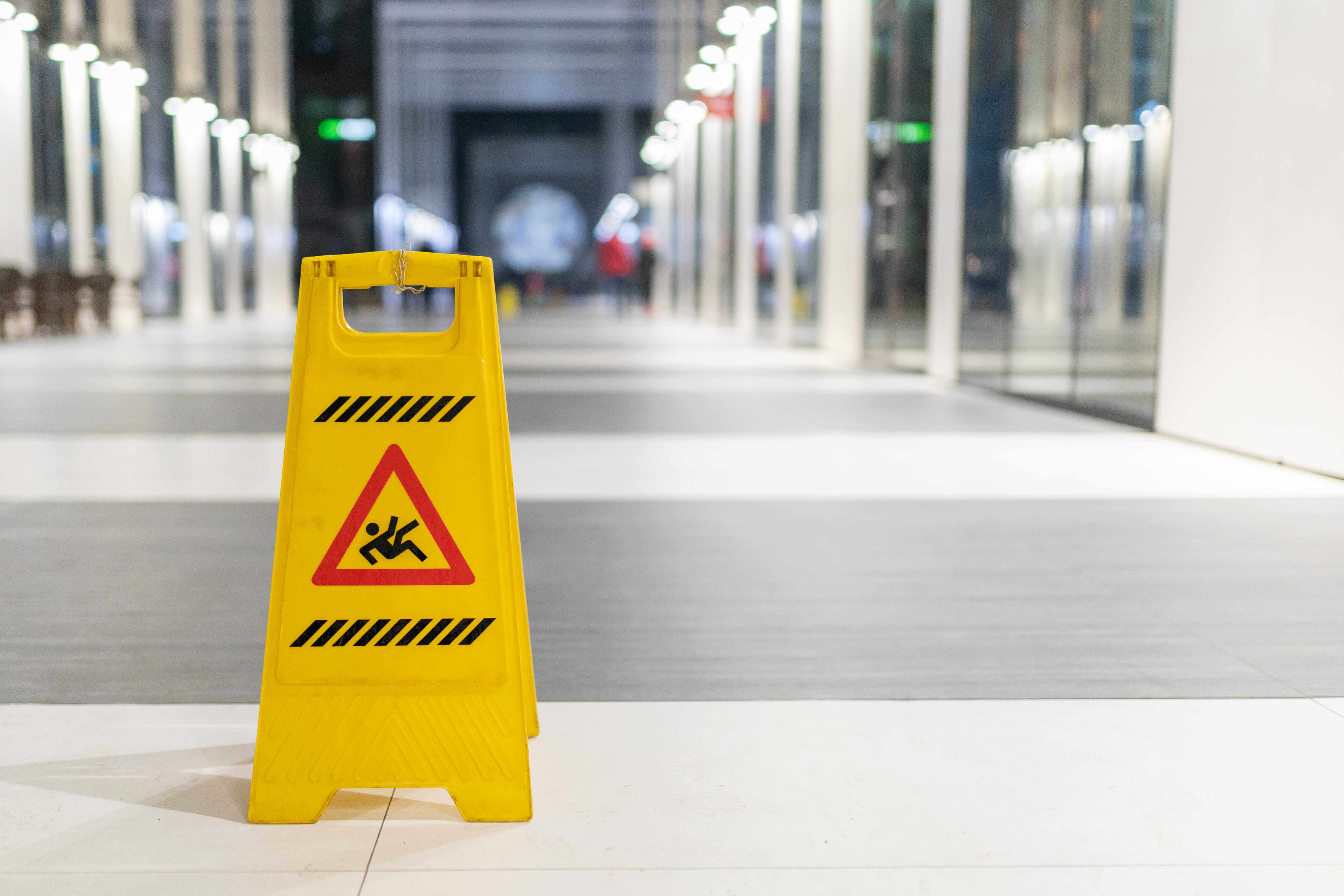 wet floor sign in hallway